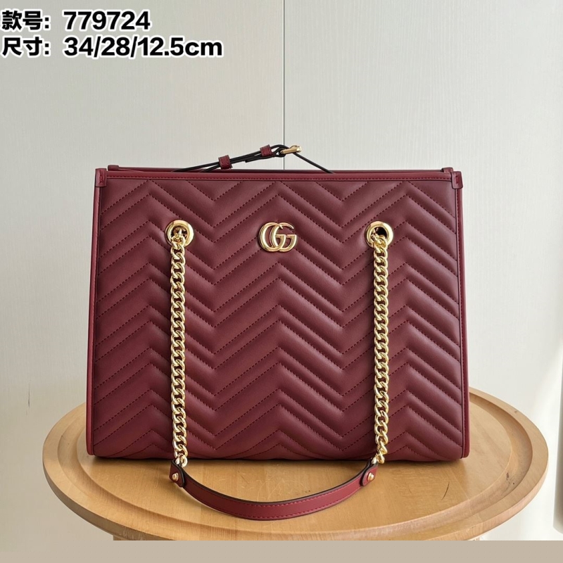 G*u*i shopping bags